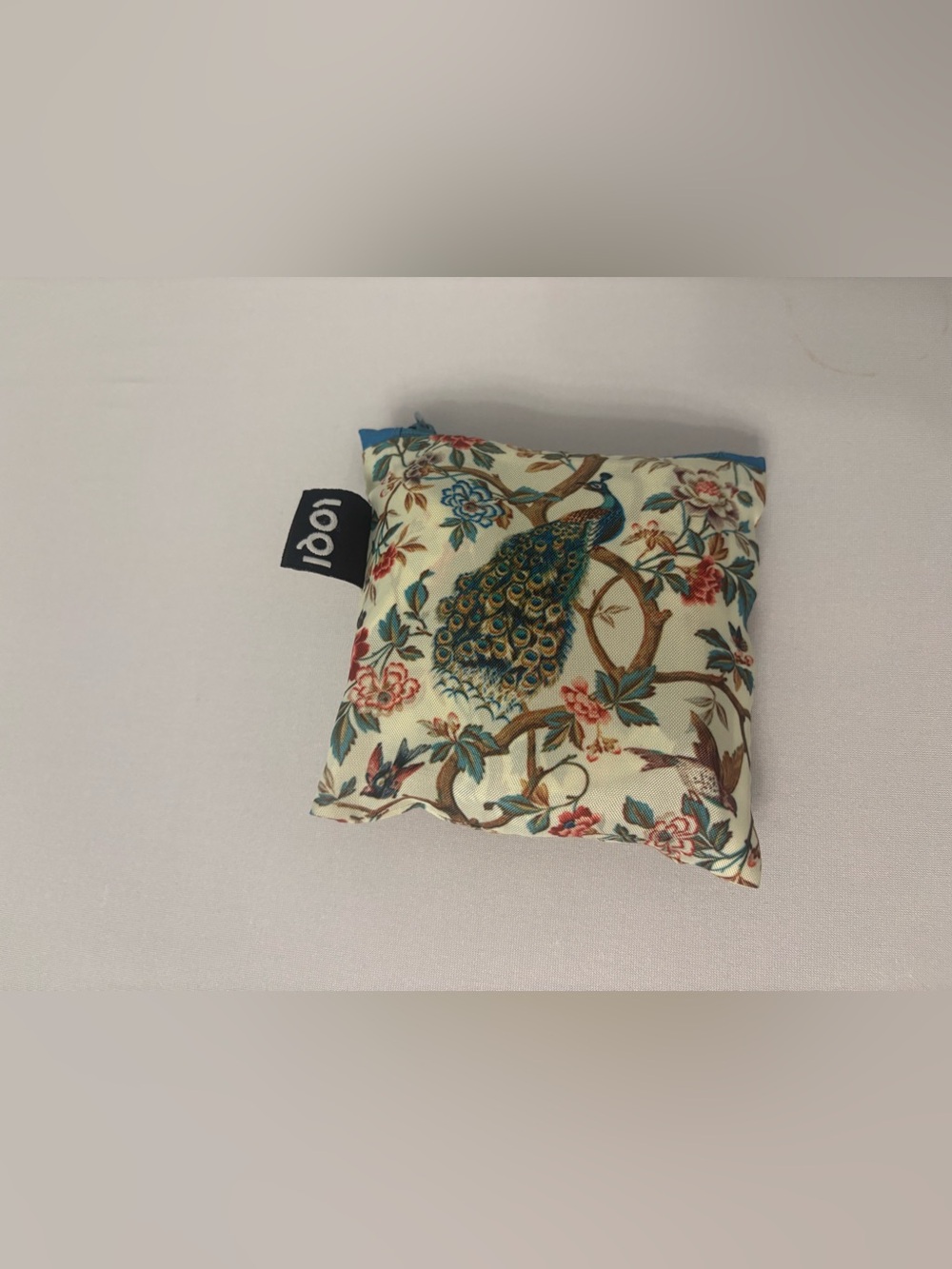 LOQI Peacock Floral Accent Pillow in Cream and Teal